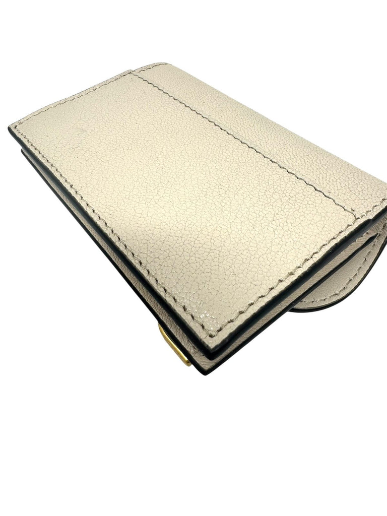 Tarjetero Saddle
